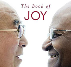 Photo: The Dalai Lama and Archbishop Desmond Tutu, on cover of The Book of Joy (cropped)
