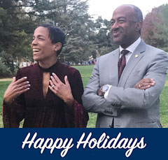 Image: Photo of LeShelle and Gary May, standing on the Quad; Happy Holidays written across the bottom