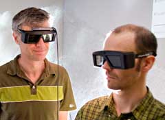 Photo: Michael Oskin and Oliver Kreylos wear virtual reality headsets
