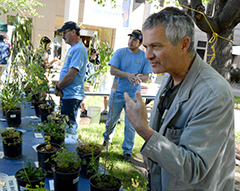 Photo: Guy Kyser answers questions at the Plant Sciences 'Weed Doctor' exhibit on Picnic Day