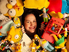 Photo: Karma Waltonen surrounded by memorabilia from The Simpsons