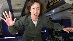 Photo: Liz Warren experiences weightlessness as she floats in a NASA training aircraft