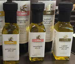 Photo: Three 100 ml bottles of UC Davis Olive Oil