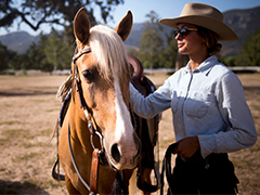 Photo: Horse trainer Abby Followwill with a Santa Cruz Island horse
