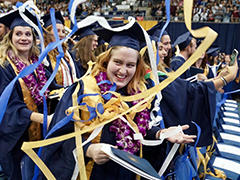 Photo: UC Davis graduates celebrate with ribbons